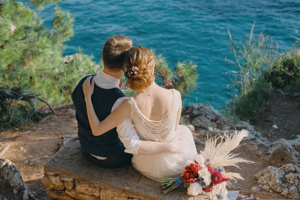 romantic wedding couple sits background beautiful island sea enjoys beautiful view montenegro