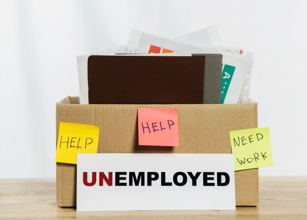 arrangement with box unemployed sign