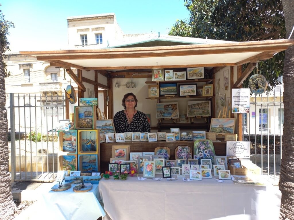 My mom at our stall at villa rundle in 2024